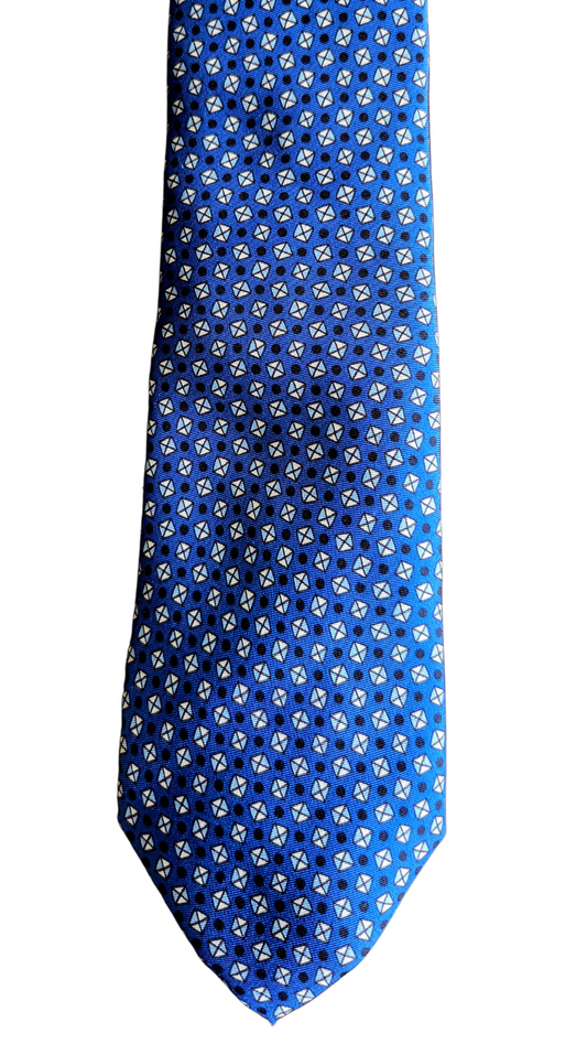 A blue necktie with a repeating white and yellow geometric pattern, shown flat against a plain white background.