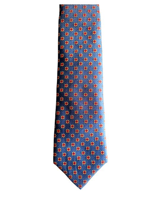 A blue necktie with a repeating red and orange floral pattern, shown flat against a plain white background.