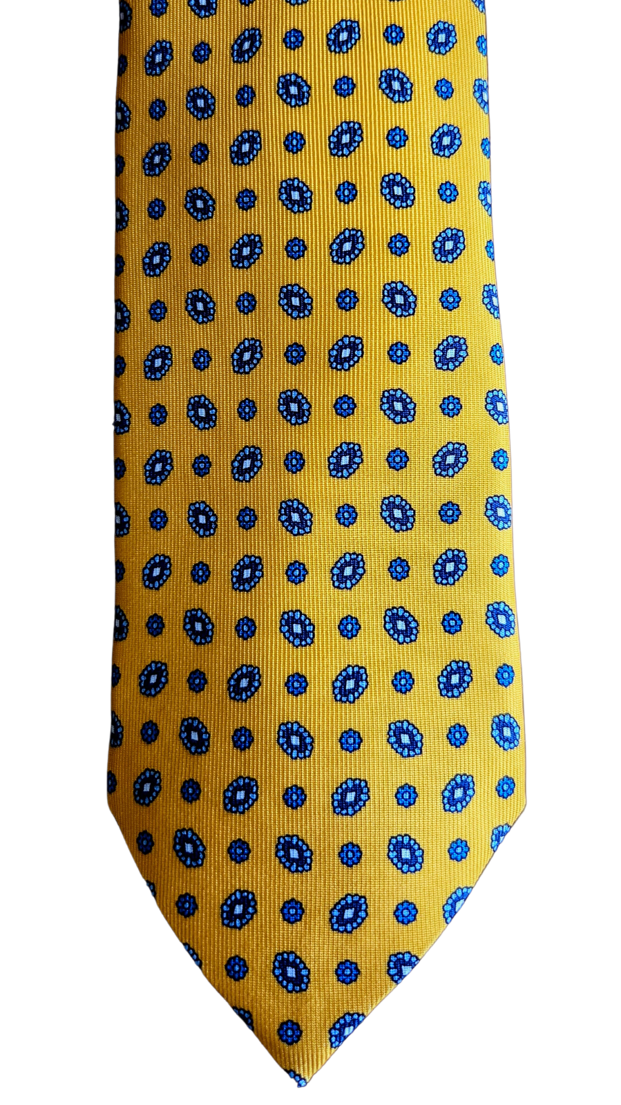 A yellow necktie with a repeating blue and white geometric pattern, shown flat against a plain white background.