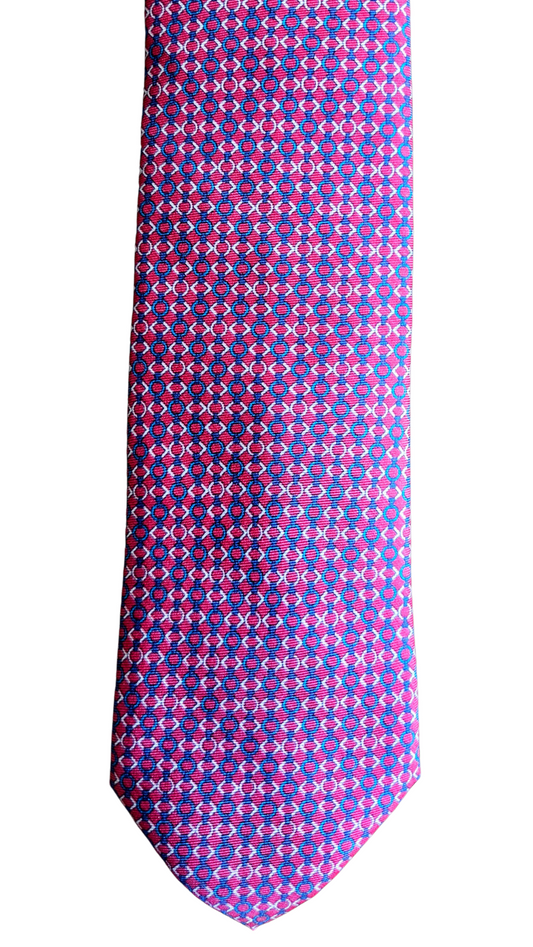 A purple necktie with a repeating pink geometric pattern, shown flat against a plain white background.